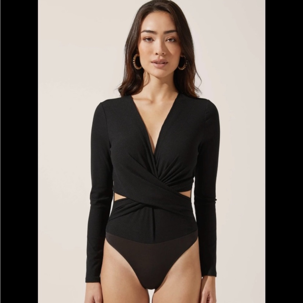 Black long sleeved ASTR the label bodysuit, size S